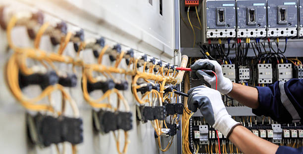 Professional Electrician technician working in East Williston, NY